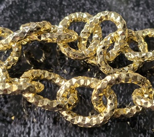 Bewerkte schakelketting 19*15mm goudkleur aluminium (10cm)