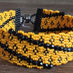 Oranje/zwart 3-drops peyote armband 19.5cm
